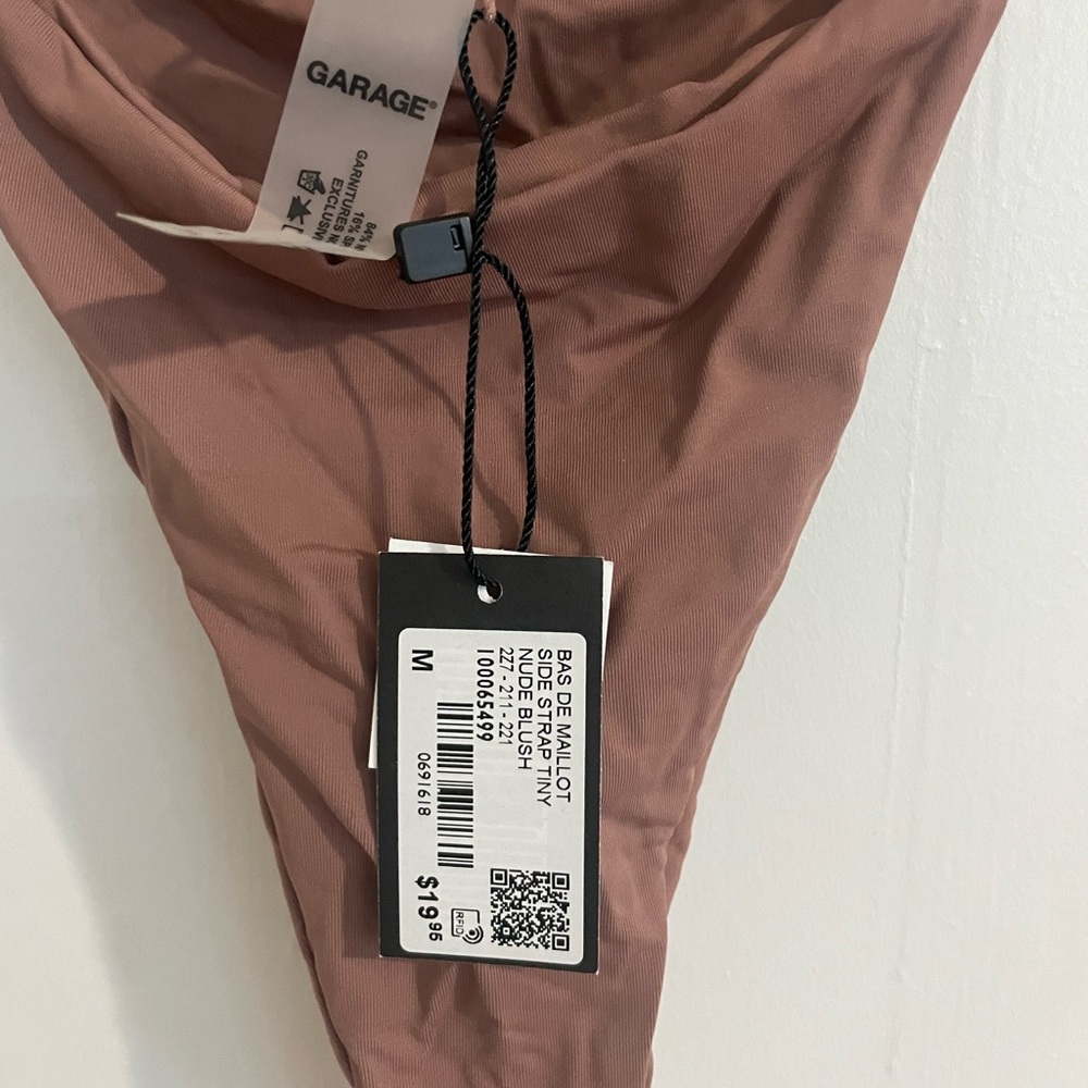Medium bottom tan swimsuit never worn comes with tag